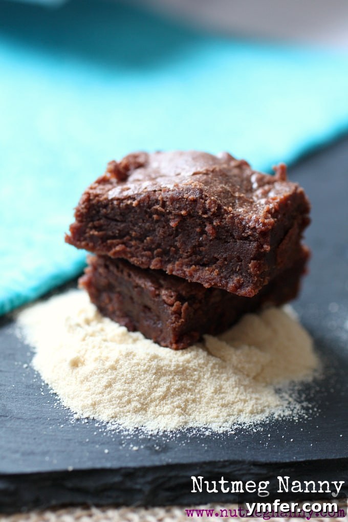 Vanilla Malted Brownie Ice Cream by Nutmeg Nanny A scoop of Vanilla Malted Brownie Ice Cream in a bowl with a spoon