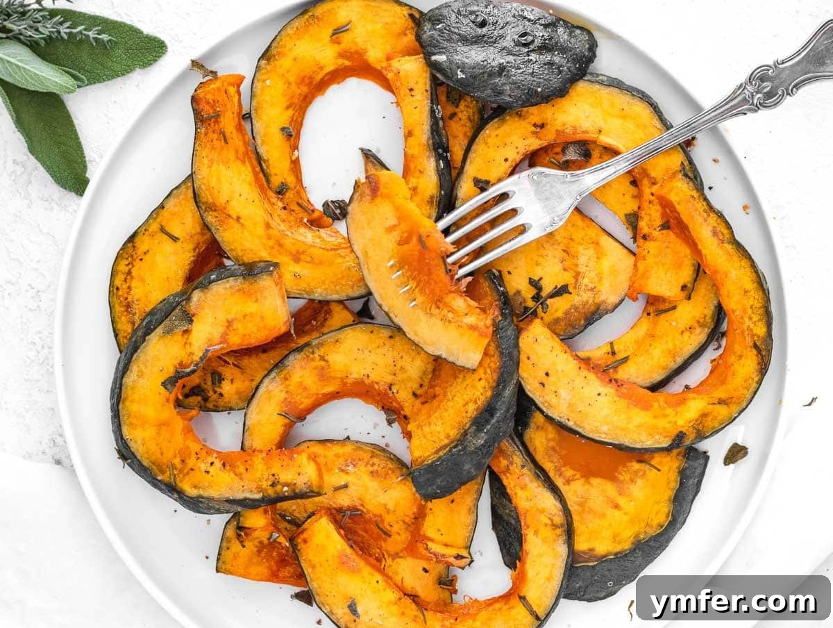 Golden Roasted Kabocha 3 Close-up of roasted kabocha squash slices, perfectly caramelized and ready to eat, with a sprinkle of fresh herbs.