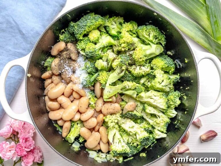 Vibrant Broccoli Cream 14 broccoli, white beans, salt, and pepper in a Dutch oven