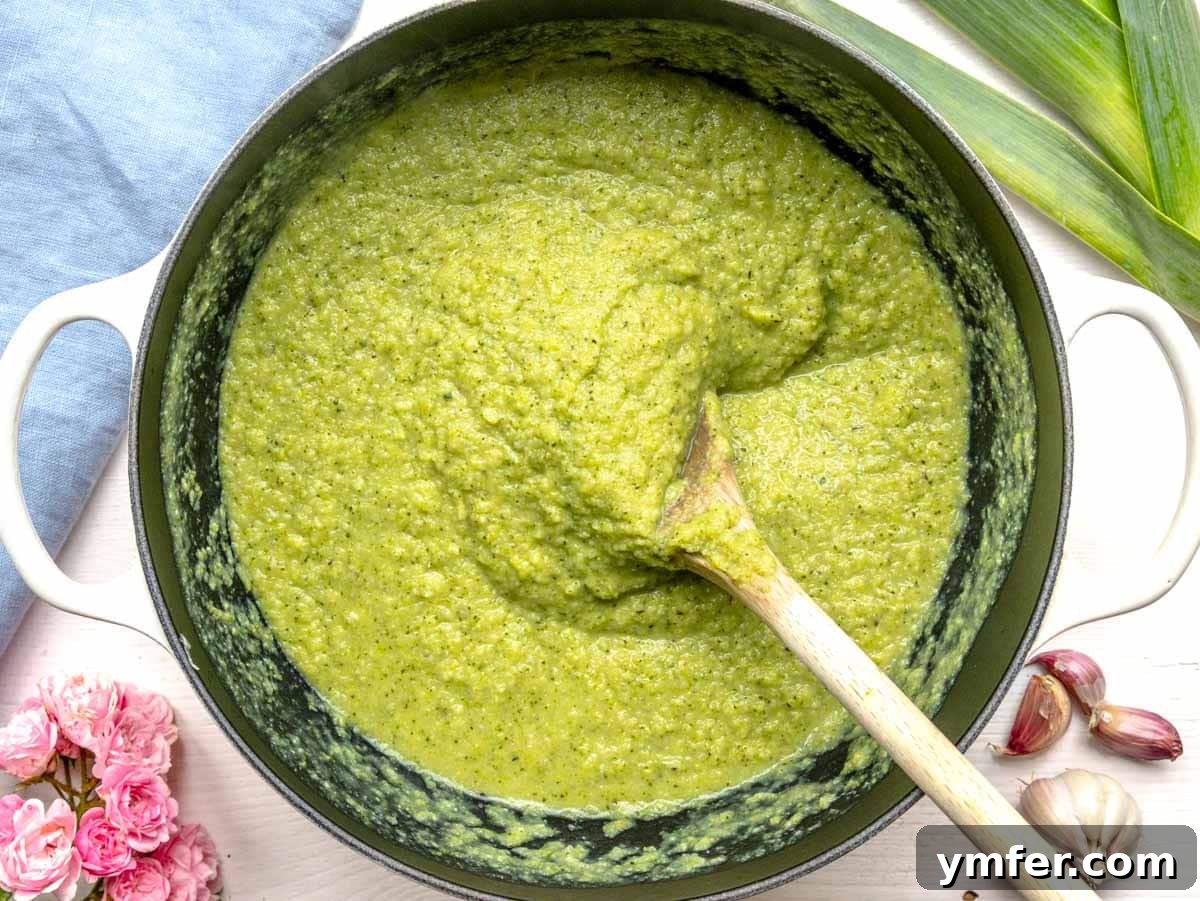 Vibrant Broccoli Cream 9 Smooth, vibrant green broccoli soup in a pot after blending, ready to be served.