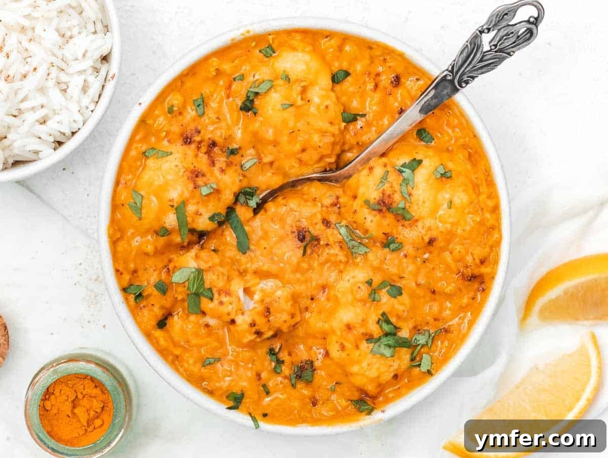 Golden Cauliflower Curry 8 Cauliflower and lentil curry in a bowl, showcasing a hearty and flavorful variation.