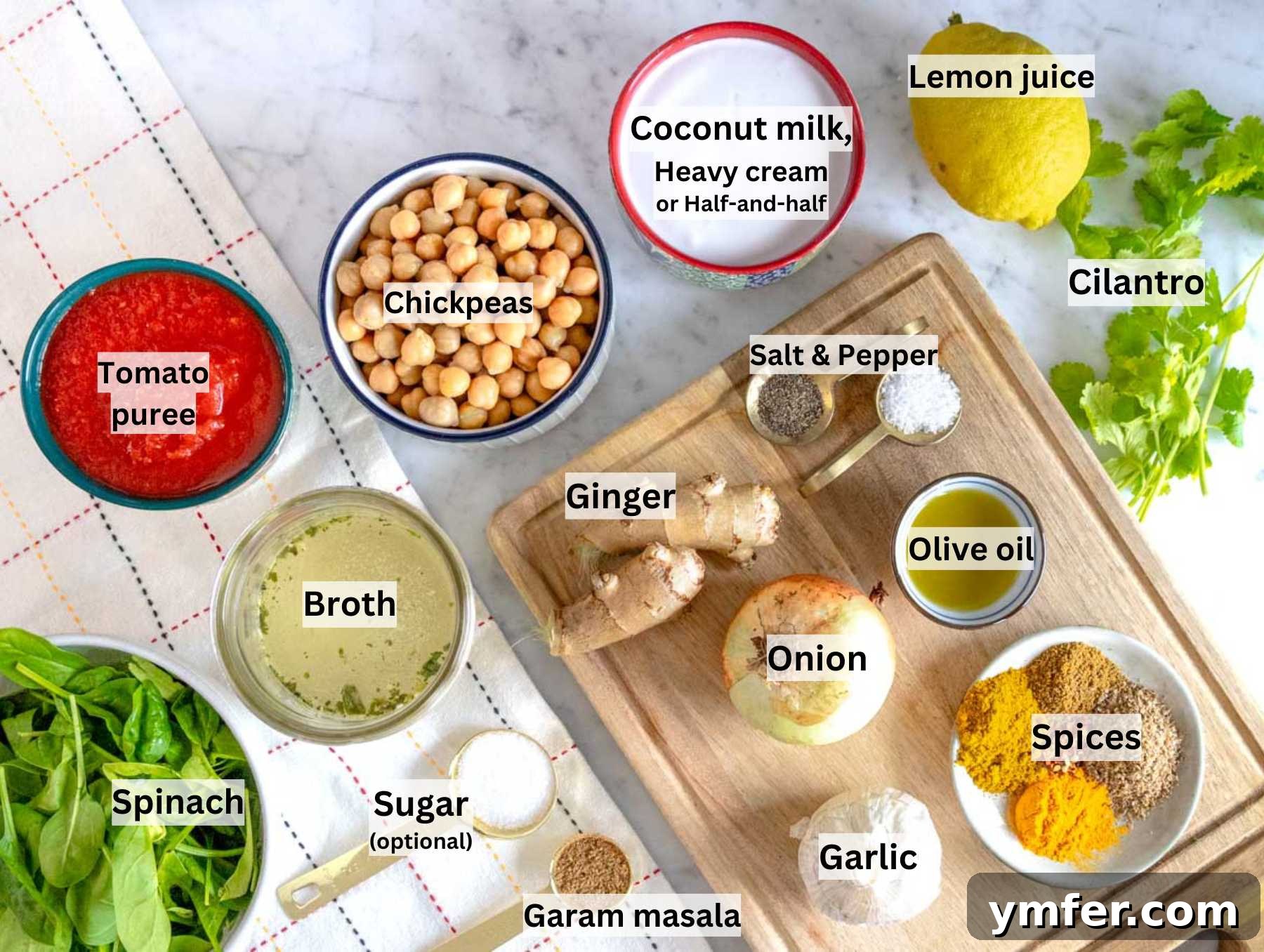 Creamy Coconut Chickpea Curry 3 Ingredients for chickpea curry on a marble table.