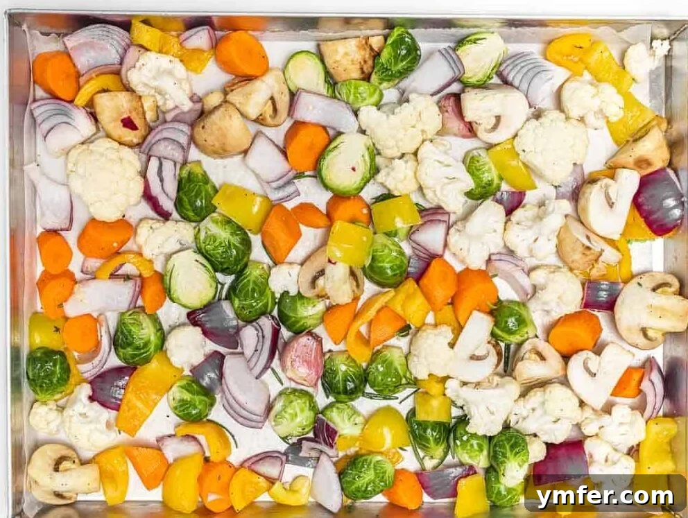 Sheet Pan Roasted Delights 3 A mix of autumn and winter vegetables arranged on a baking tray before roasting