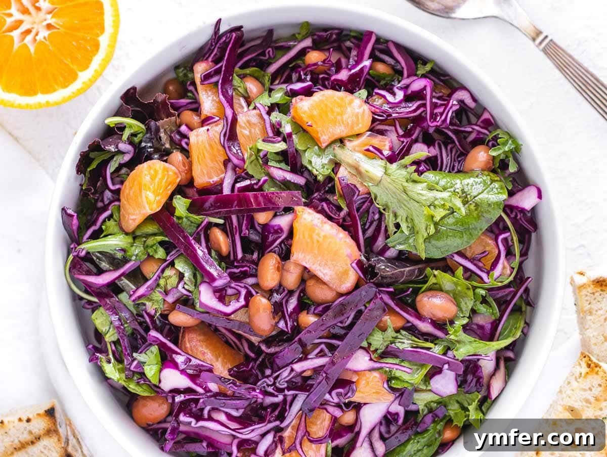 Zesty Red Cabbage Slaw 3 red cabbage and orange in a bowl