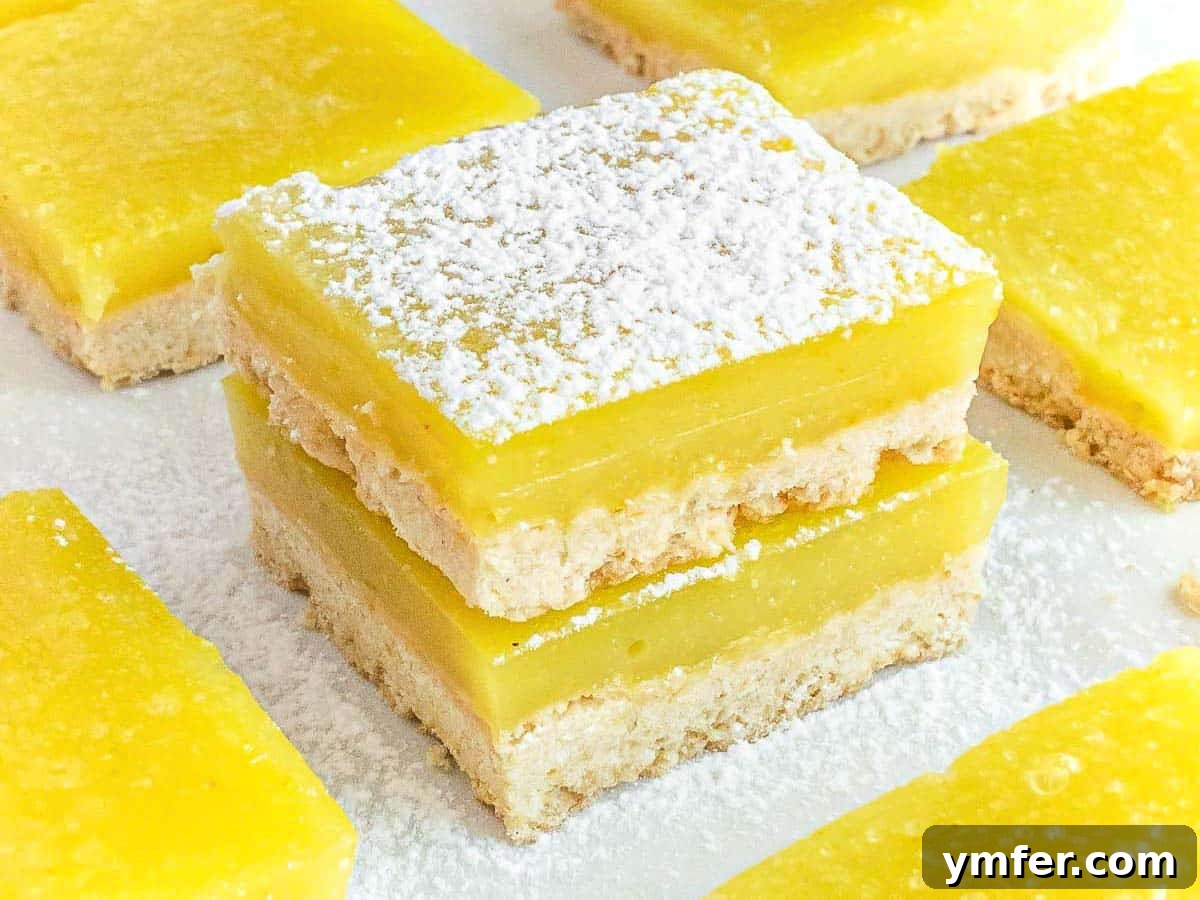 35 Effortless Dessert Delights 14 Vegan lemon bars with powdered sugar, a colorful and fun dessert
