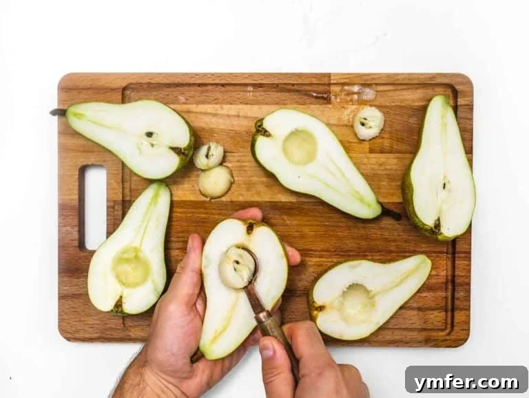 35 Effortless Dessert Delights 17 scooping out the core of the pear