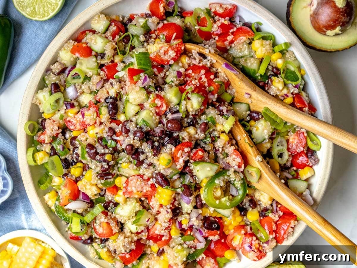 45 Effortless Vegetarian Dinner Ideas 24 quinoa salad after mixing in a white bowl with corn