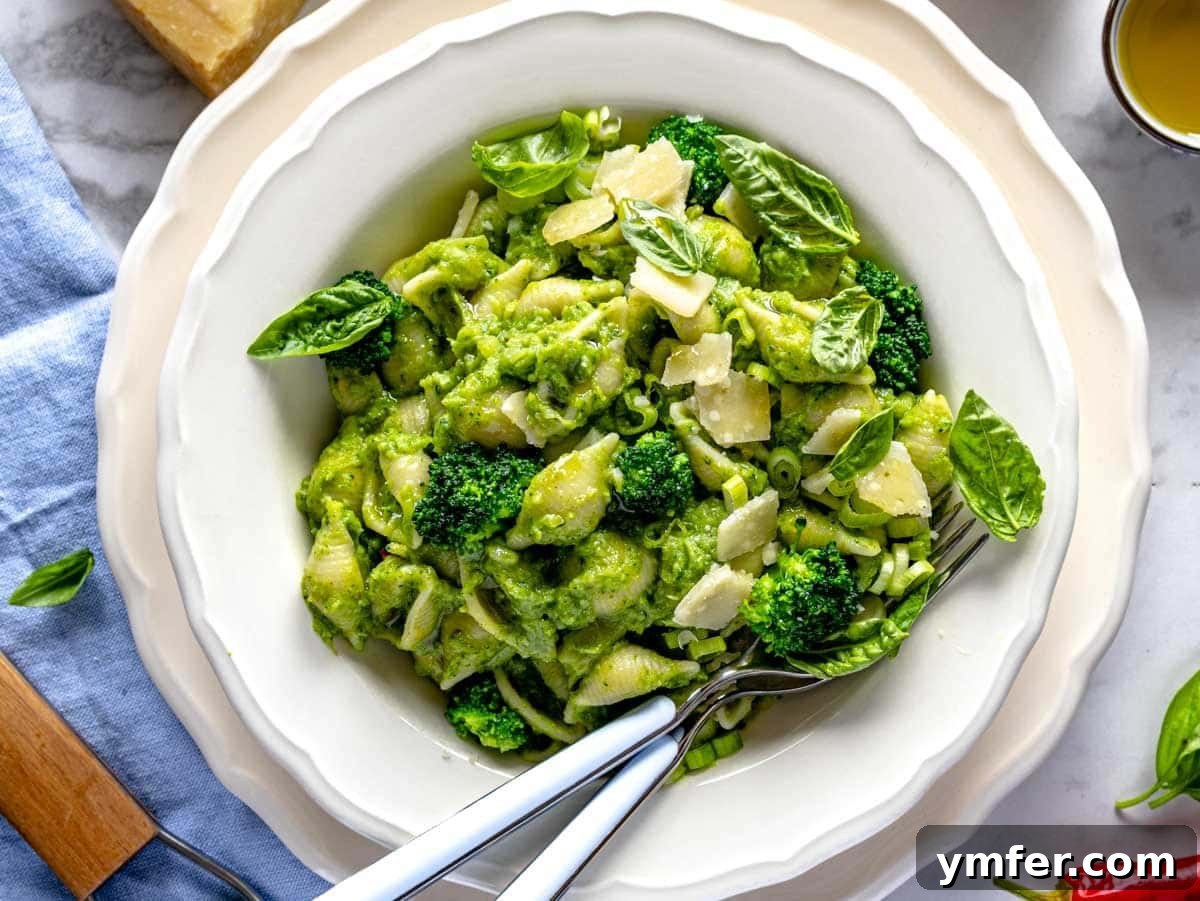 45 Effortless Vegetarian Dinner Ideas 6 Creamy broccoli pasta with basil and parmesan in a white plate