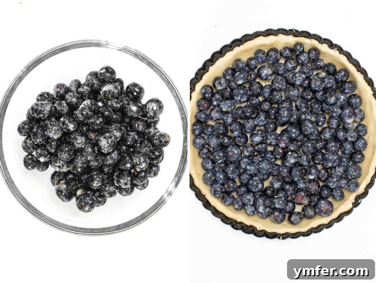 Fresh blueberries being mixed for the filling, then spread into the tart crust.