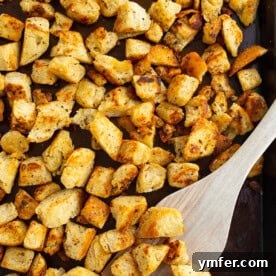 Golden Garlic Butter Croutons 6 Homemade Garlic Butter Croutons on a baking sheet.