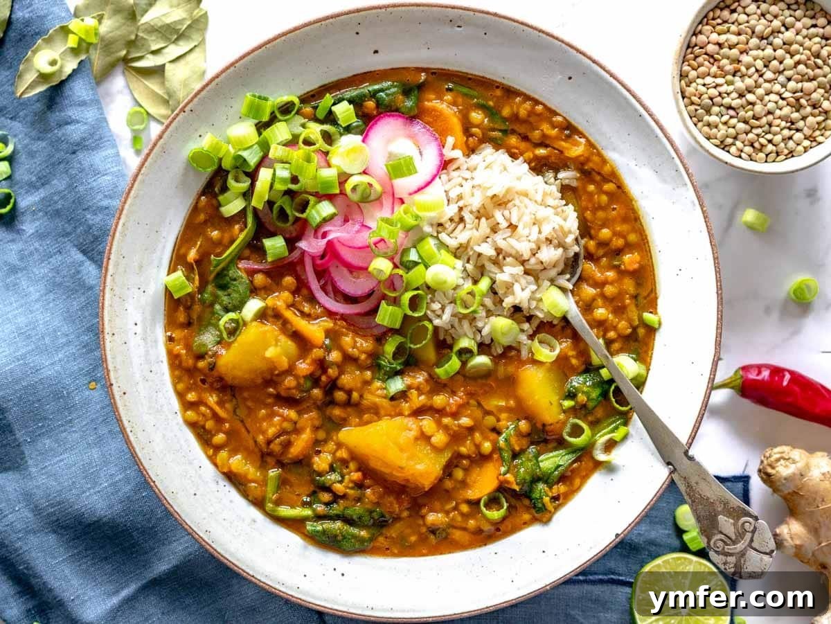 40 Flavorful Plant-Based Dinners 21 Warming curry lentil soup, garnished with rice, pickled onions, and fresh scallions.