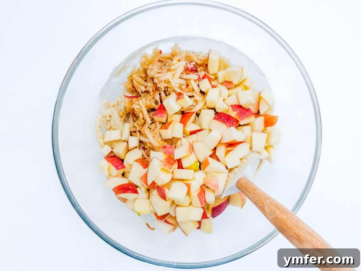 Cinnamon Apple Vegan Muffins 8 Chopped and grated apples gently folded into the muffin batter