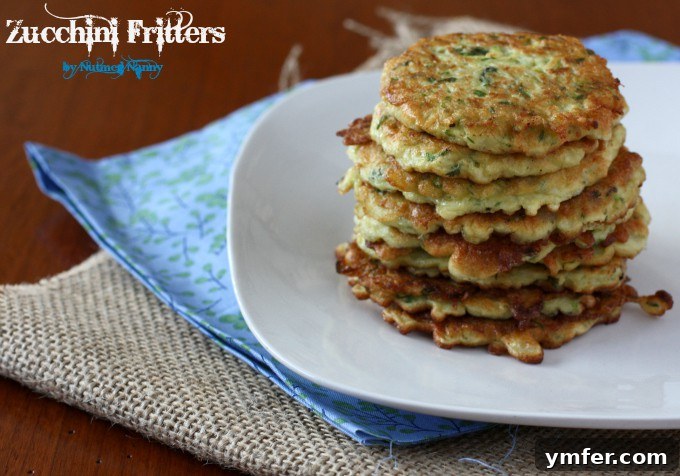 Perfectly Cooked Zucchini Fritters Close-up of freshly cooked zucchini fritters, golden brown and perfectly textured, served on a plate and ready to eat.