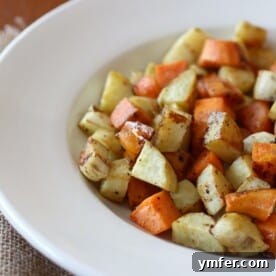 Caramelized Maple Sweet Potatoes 5 A bowl of freshly roasted maple sweet potatoes, glistening and ready to eat.