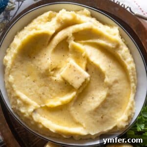 Velvety Garlic Potatoes 9 A close-up of creamy garlic mashed potatoes, perfectly seasoned and ready to serve.