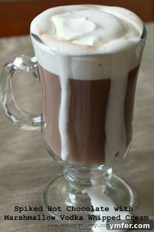 Spiked Hot Chocolate with Marshmallow Vodka Whipped Cream by Nutmeg Nanny Spiked Hot Chocolate with Marshmallow Vodka Whipped Cream by Nutmeg Nanny