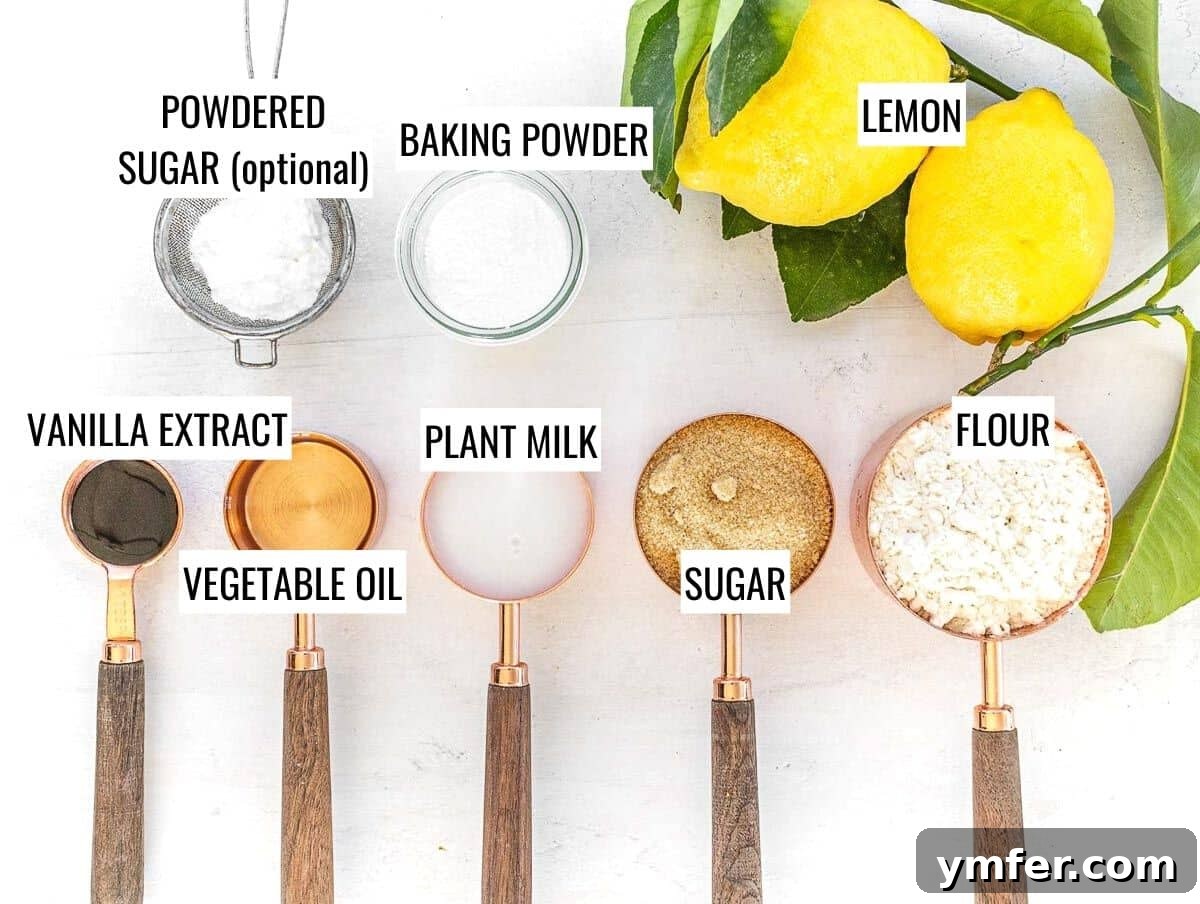 Arrangement of lemon muffin ingredients including lemons, flour, sugar, and milk.