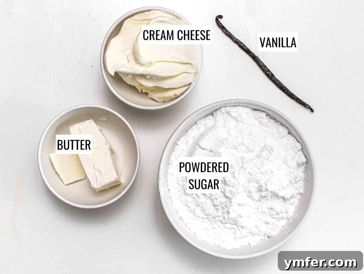 Ingredients for cream cheese frosting including cream cheese, vanilla, butter, and powdered sugar.
