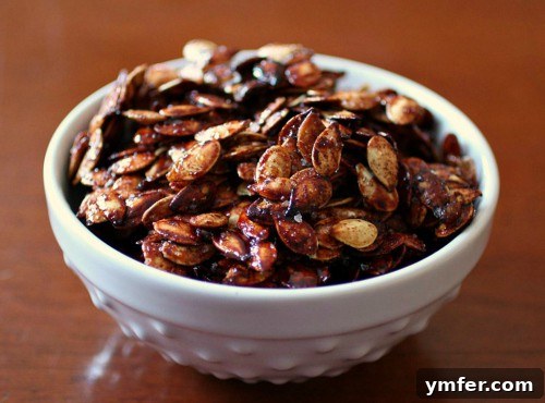 Sweet & Salty Roasted Pumpkin Seeds by Nutmeg Nanny Sweet & Salty Roasted Pumpkin Seeds, a perfect snack for game day by Nutmeg Nanny