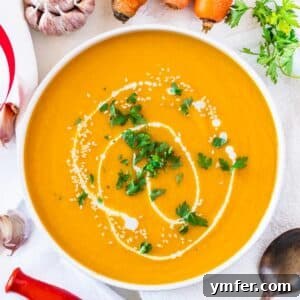 carrot soup with garlic and greens