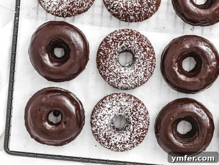 Decadent Chocolate-Coated Doughnuts 21 powdered sugar and chocolate glazed donuts