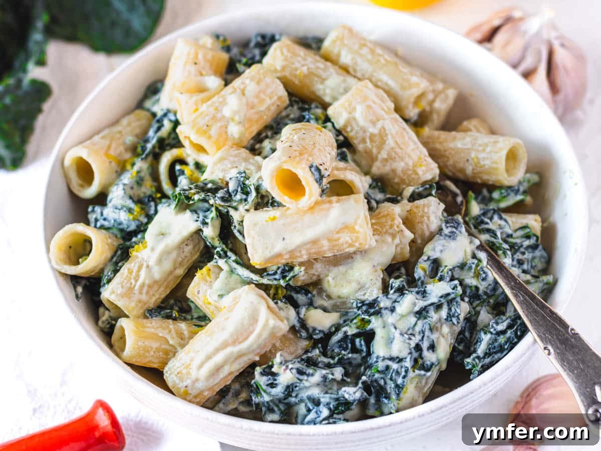 Royal Spire Sweet 13 Portion of creamy kale pasta in a container, with text overlay 'kale pasta and how to store it'