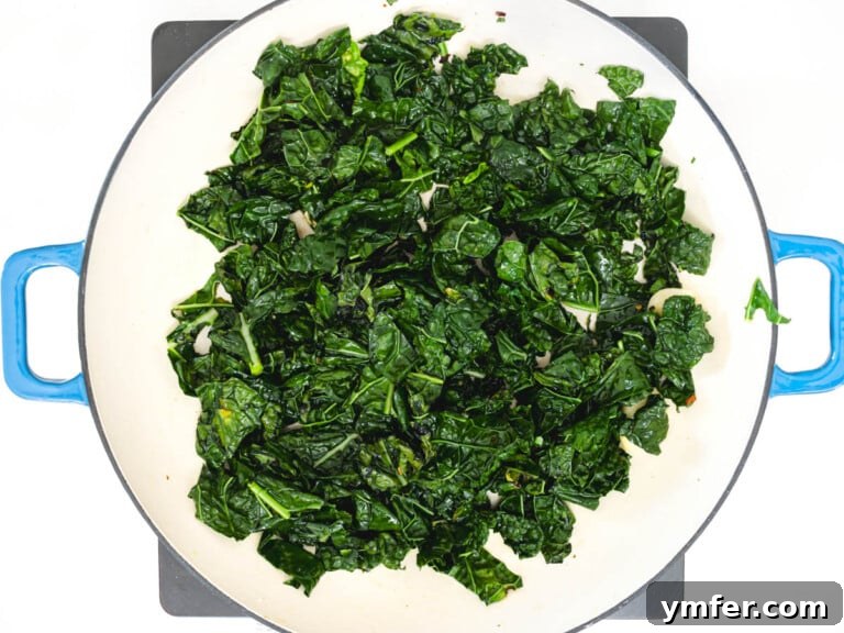Royal Spire Sweet 17 kale leaves sautèeing in a skillet