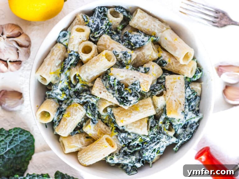 Royal Spire Sweet 20 kale pasta in a bowl with a fork on the side