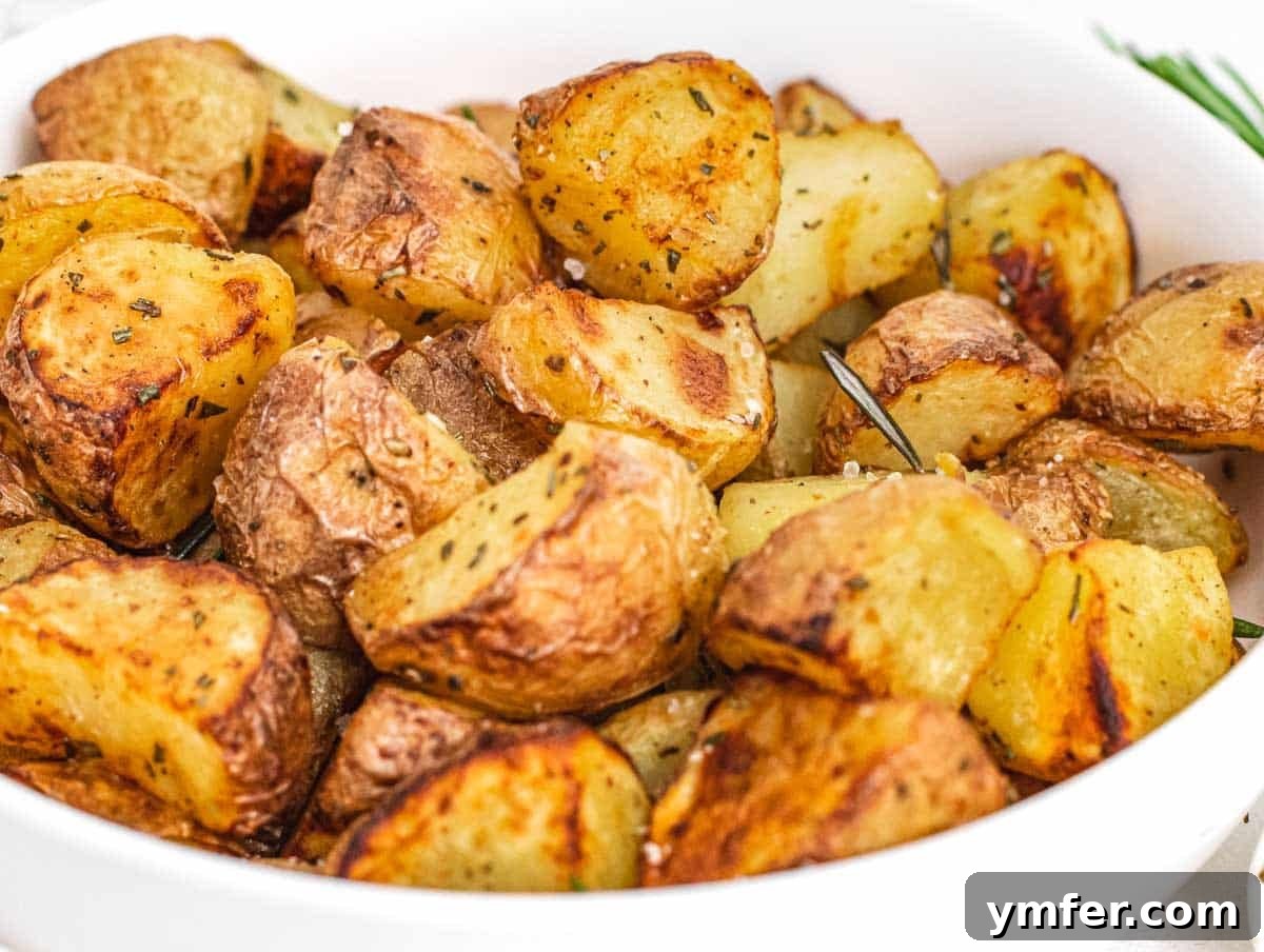 Crispy Air Fryer Potatoes 3 Air fryer potatoes in a white bowl
