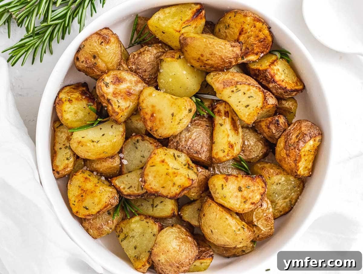 Crispy Air Fryer Potatoes 10 potatoes after frying in a white bowl
