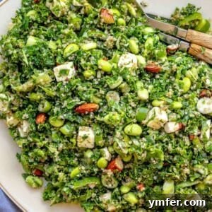 Colorful kale quinoa salad with feta and lemon dressing, a high-protein vegetarian recipe.