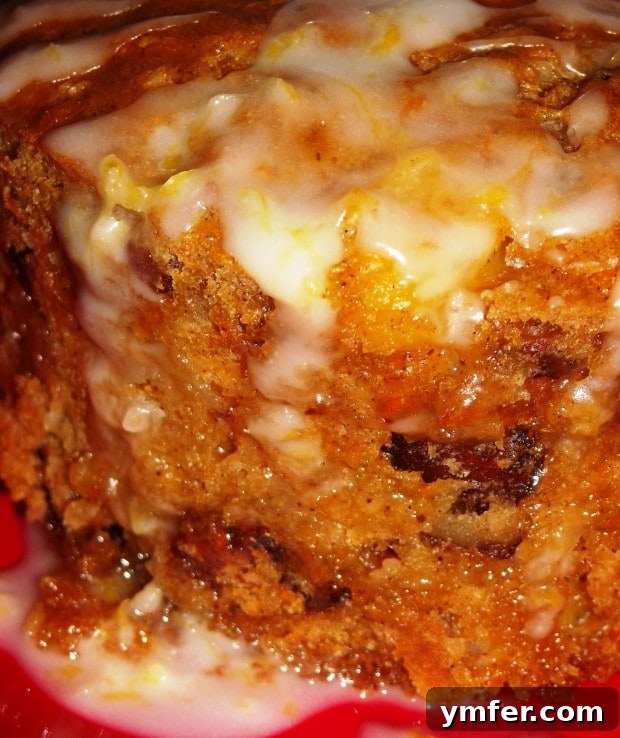 Toaster Oven Carrot Cake by Nutmeg Nanny Moist toaster oven carrot cake topped with lemon glaze, pineapple, pecans, and currants, perfect for a small kitchen or dorm.