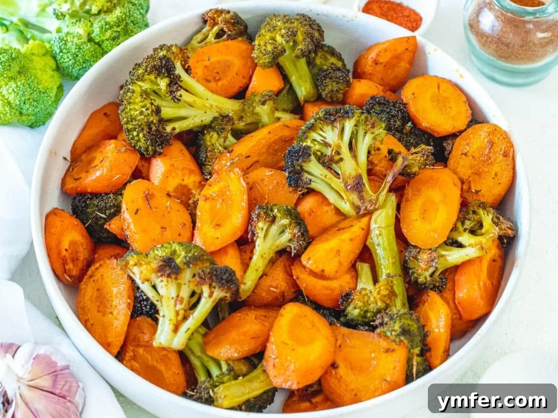 Quick & Delicious: 20 Easy Broccoli Recipes 12 A simple yet appetizing bowl of roasted carrots and broccoli, seasoned to perfection.