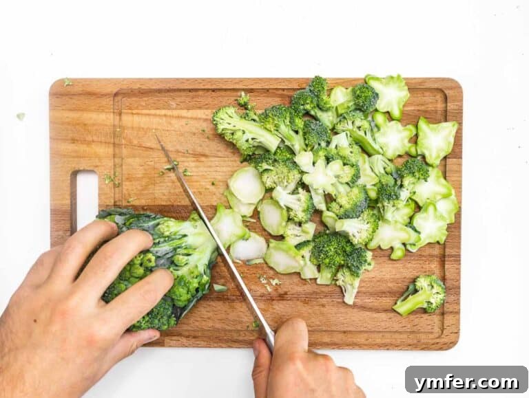 Quick & Delicious: 20 Easy Broccoli Recipes 21 Preparation of broccoli florets and stem for roasting.