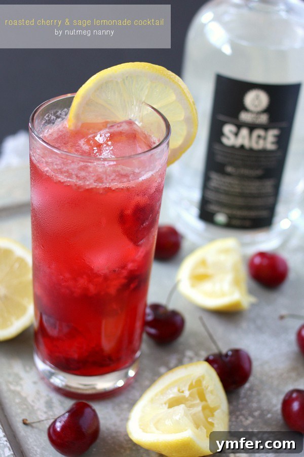 Roasted Cherry Sage Lemonade Cocktail by Nutmeg Nanny Close-up of the Roasted Cherry Sage Lemonade Cocktail, highlighting its fresh ingredients and inviting texture.