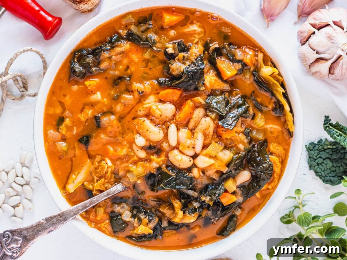 Kale, Simplified 4 Rustic Tuscan white bean soup with a silver spoon and fresh herbs