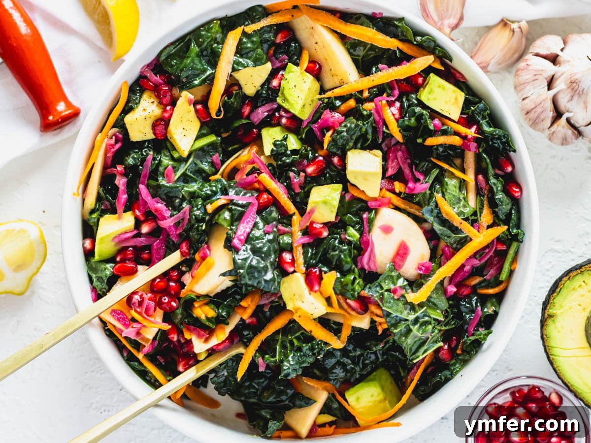 Kale, Simplified 3 Fresh kale salad featuring green apple slices and red cabbage for a vibrant mix