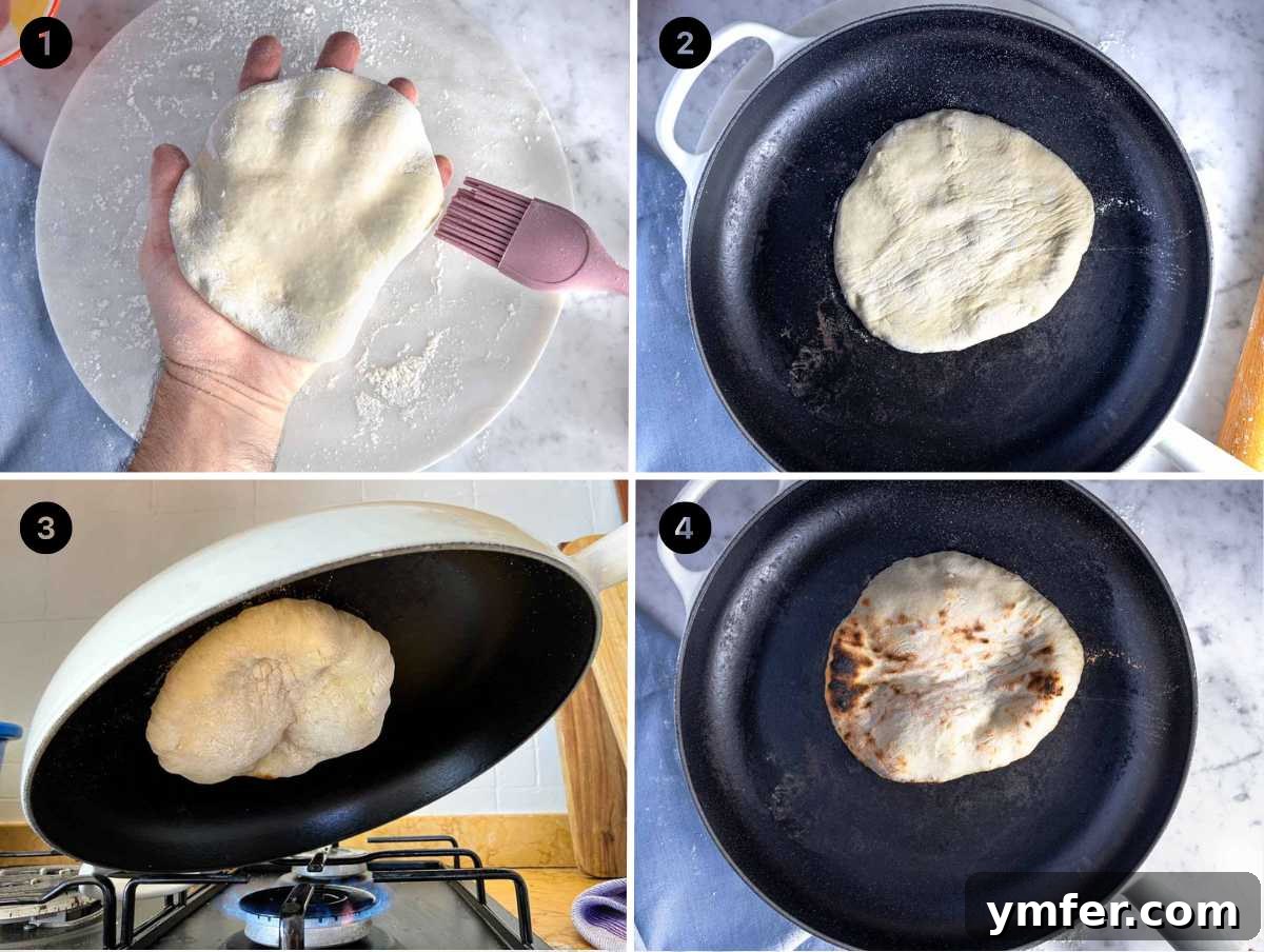Pillowy Naan 12 Naan bread cooking on a cast iron skillet over a gas stove flame, showing bubbles and charring.