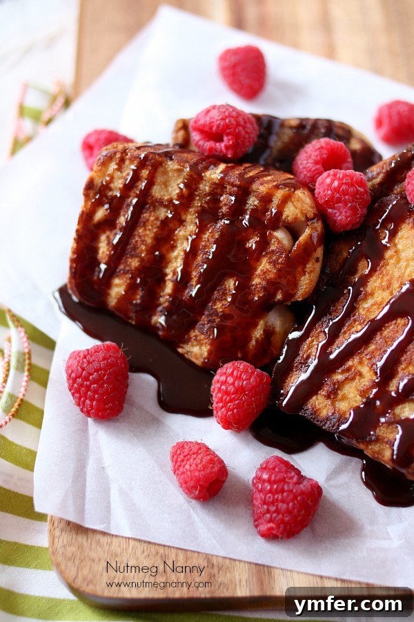 Close-up of a single slice of Espresso Angel Food Cake French Toast with melted butter, ready for toppings.