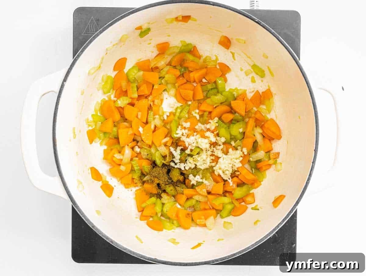 Golden Pea Goodness 7 Minced garlic and ground cumin added to the sautéed vegetable base, releasing their fragrant aromas and enhancing the flavor profile.