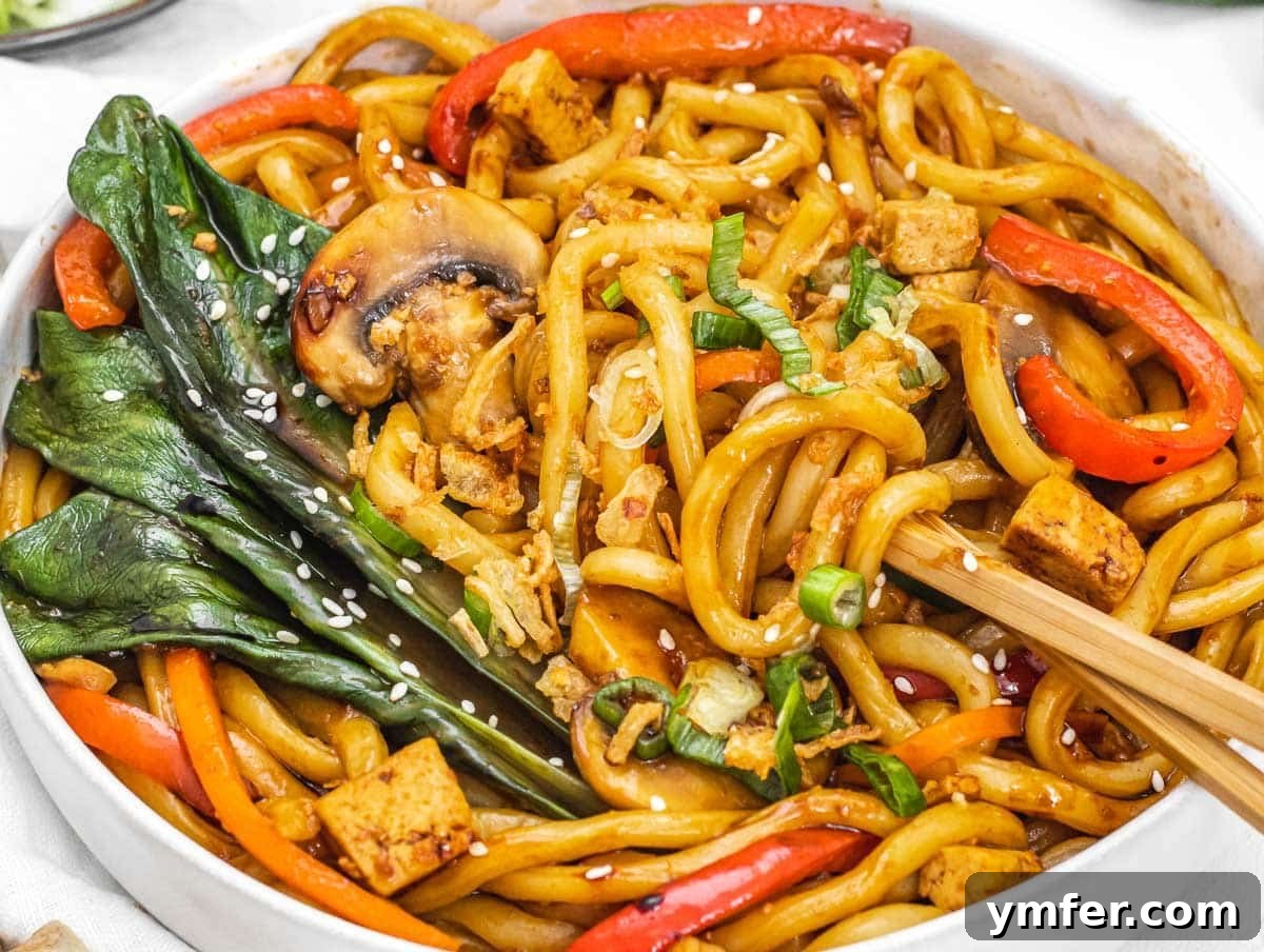 Sizzling Japanese Udon Stir-fry 6 Yaki udon with sticks and scallions