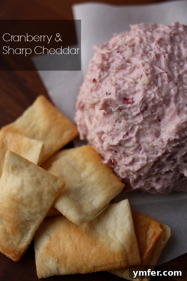 Delicious Cranberry & Sharp Cheddar Cheese Ball recipe by Nutmeg Nanny {Cranberry & Sharp Cheddar} Delicious Cranberry & Sharp Cheddar Cheese Ball recipe by Nutmeg Nanny, perfect for holiday entertaining.