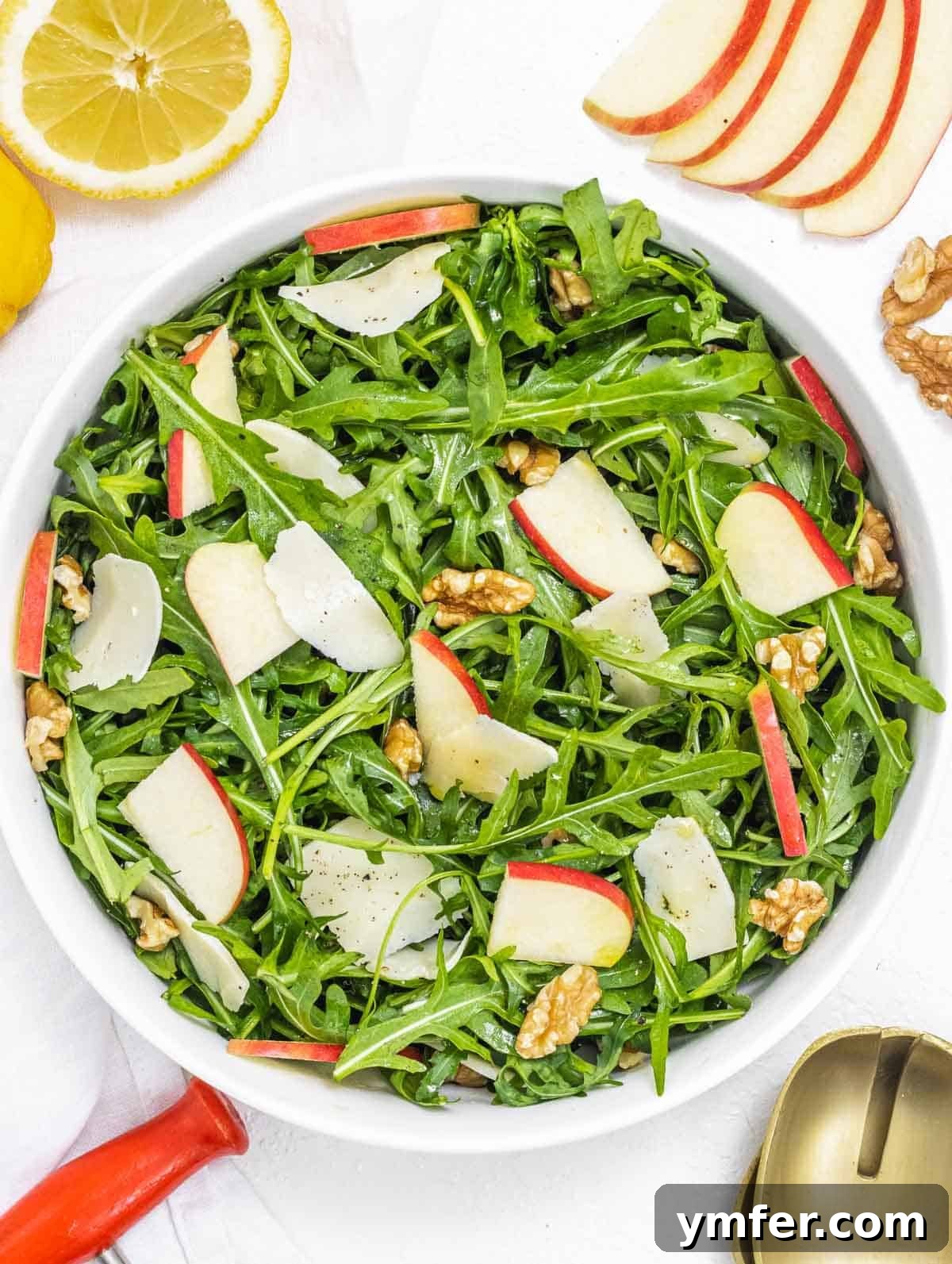 Rucola Rocket Greens with Citrus Vinaigrette 2 Arugula salad with red apple, a vibrant and healthy dish