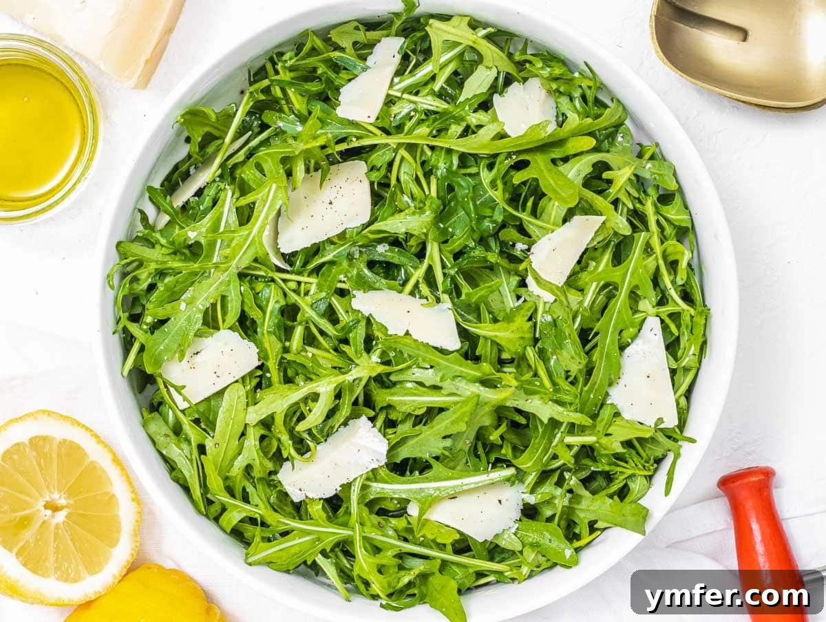 Rucola Rocket Greens with Citrus Vinaigrette 8 Arugula salad with lemon and shaved parmesan ready to serve