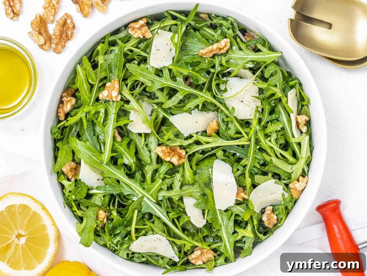 Rucola Rocket Greens with Citrus Vinaigrette 9 Arugula salad with walnuts and lemon slices