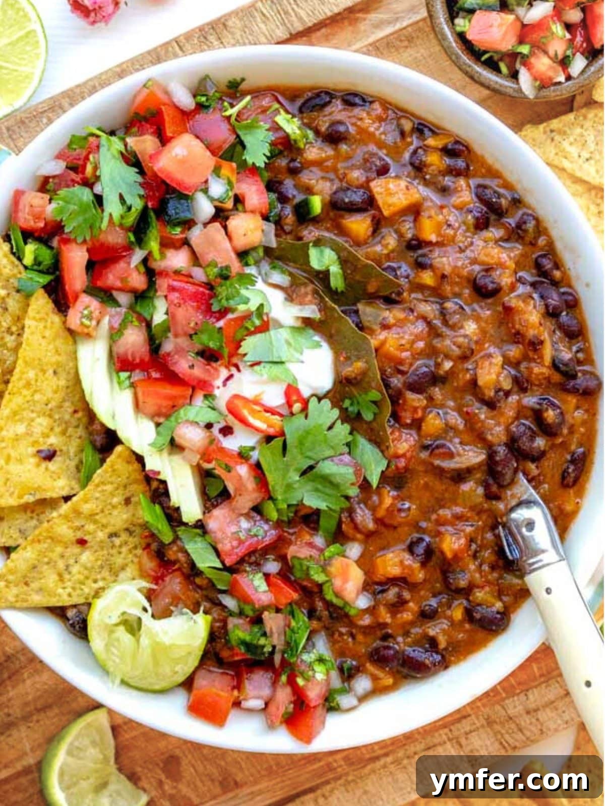 Rich Black Bean Comfort 7 Black bean soup topped with sour cream and pico de gallo