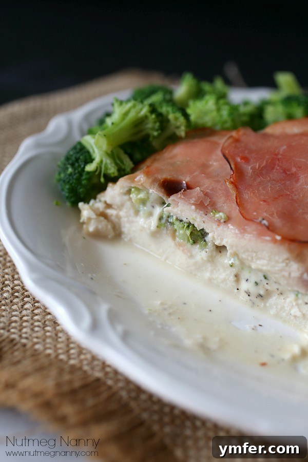 Served Broccoli and Cheese Stuffed Chicken Breast Serving of Broccoli and Cheese Stuffed Chicken with cappy ham