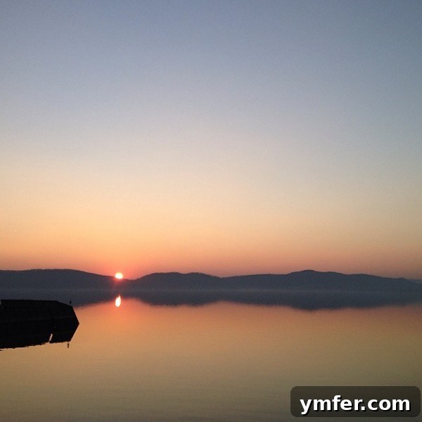 Breathtaking sunset over the calm Hudson River in Croton-on-Hudson
