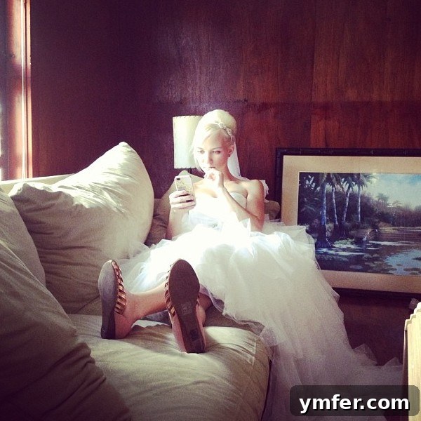 Beautiful bride in her wedding gown before walking down the aisle