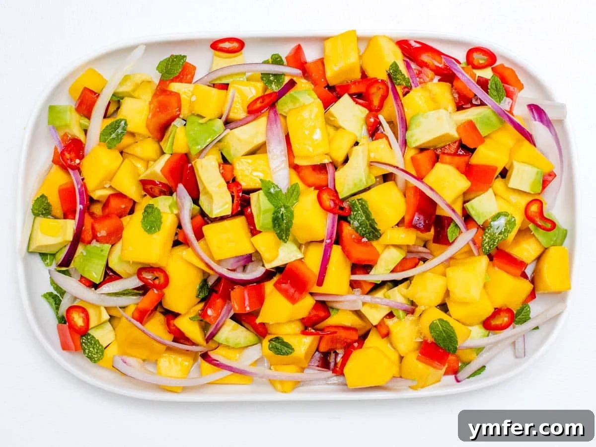 Tropical Mango Bliss 8 avocado, mange and red bell pepper in a bowl